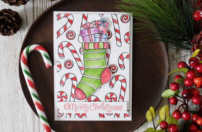 Handmade Christmas Card. 12 Cards For Christmas 2018 - Card 2. Background stamping and Christmas stockings. Using watercolours from Winsor & Newton and Sweets & Treats stamp set by Create A Smile.