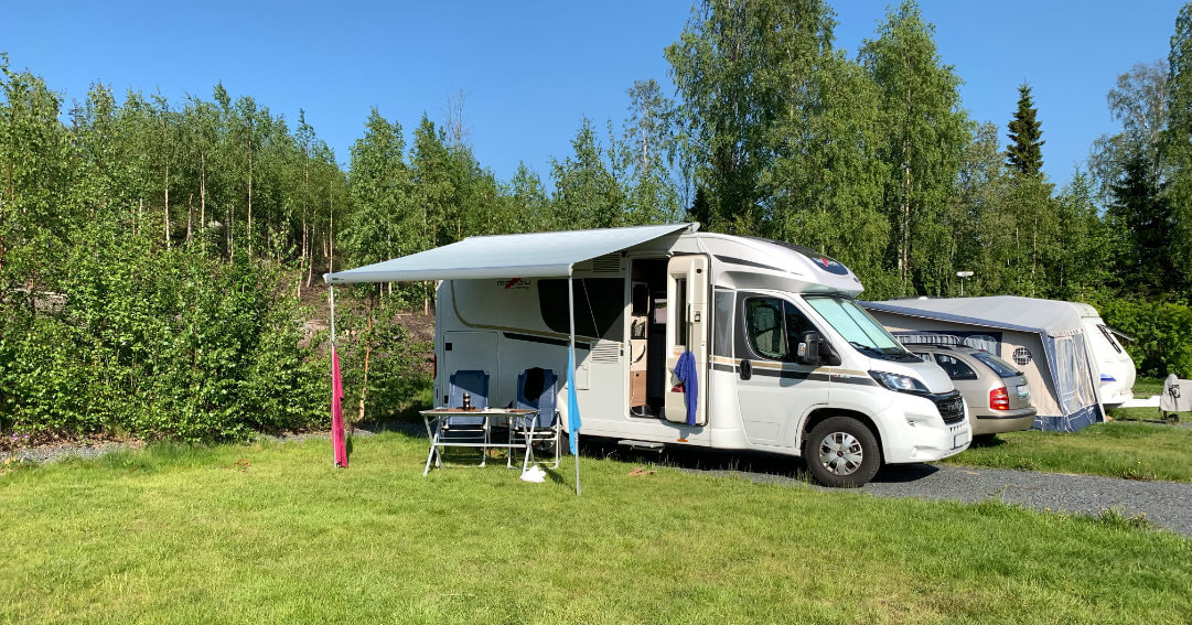 View of our motorhome, the Malibu Carthago, camping at the camp site Solbacken near the town Örnsköldsvik, Sweden.