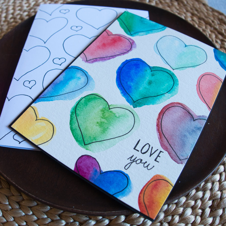 Simple Valentine Day cards with hand drown hearts.